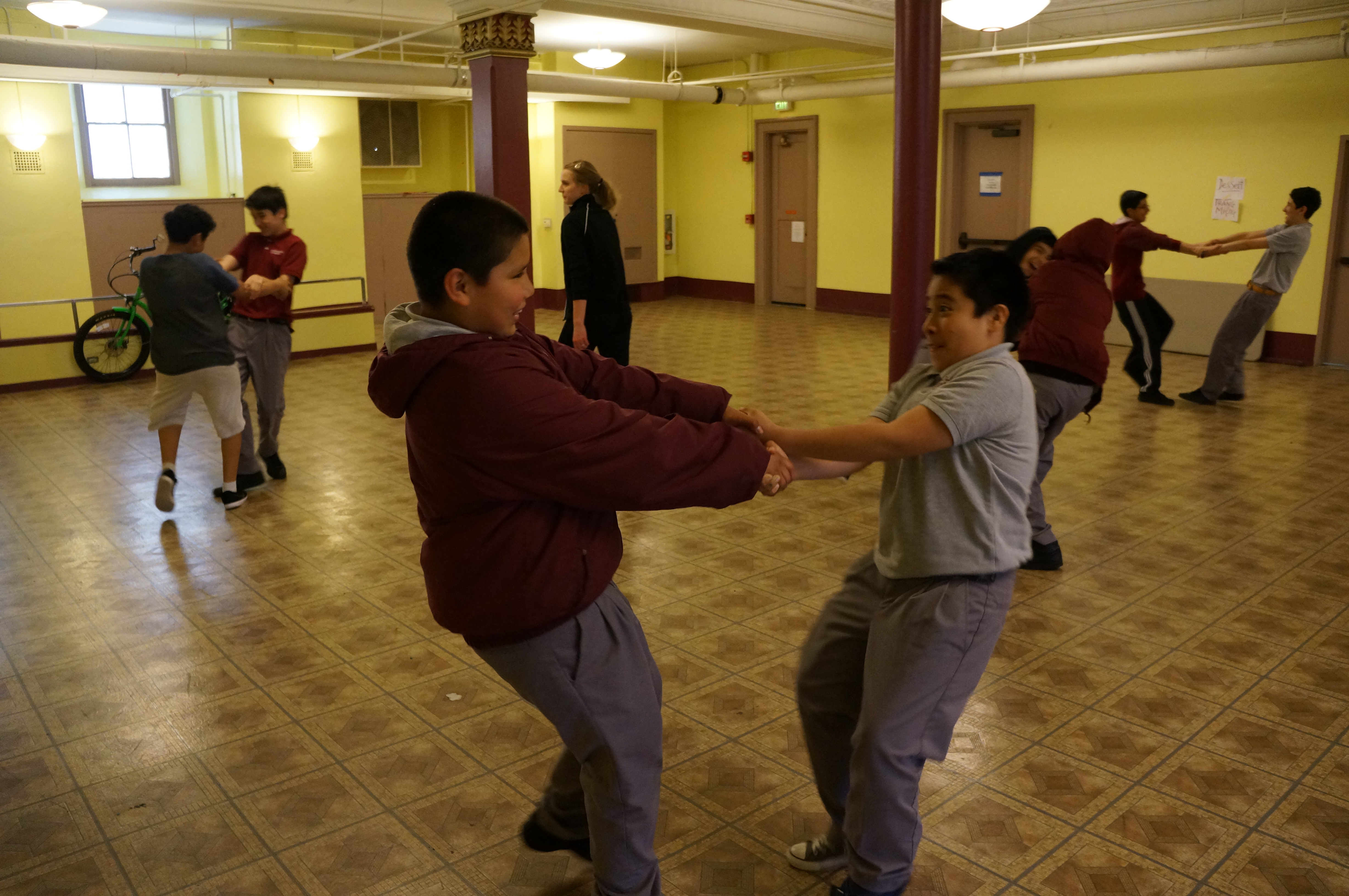 Students from DeMarillac Academy dancing in a HeART with LINES workshop