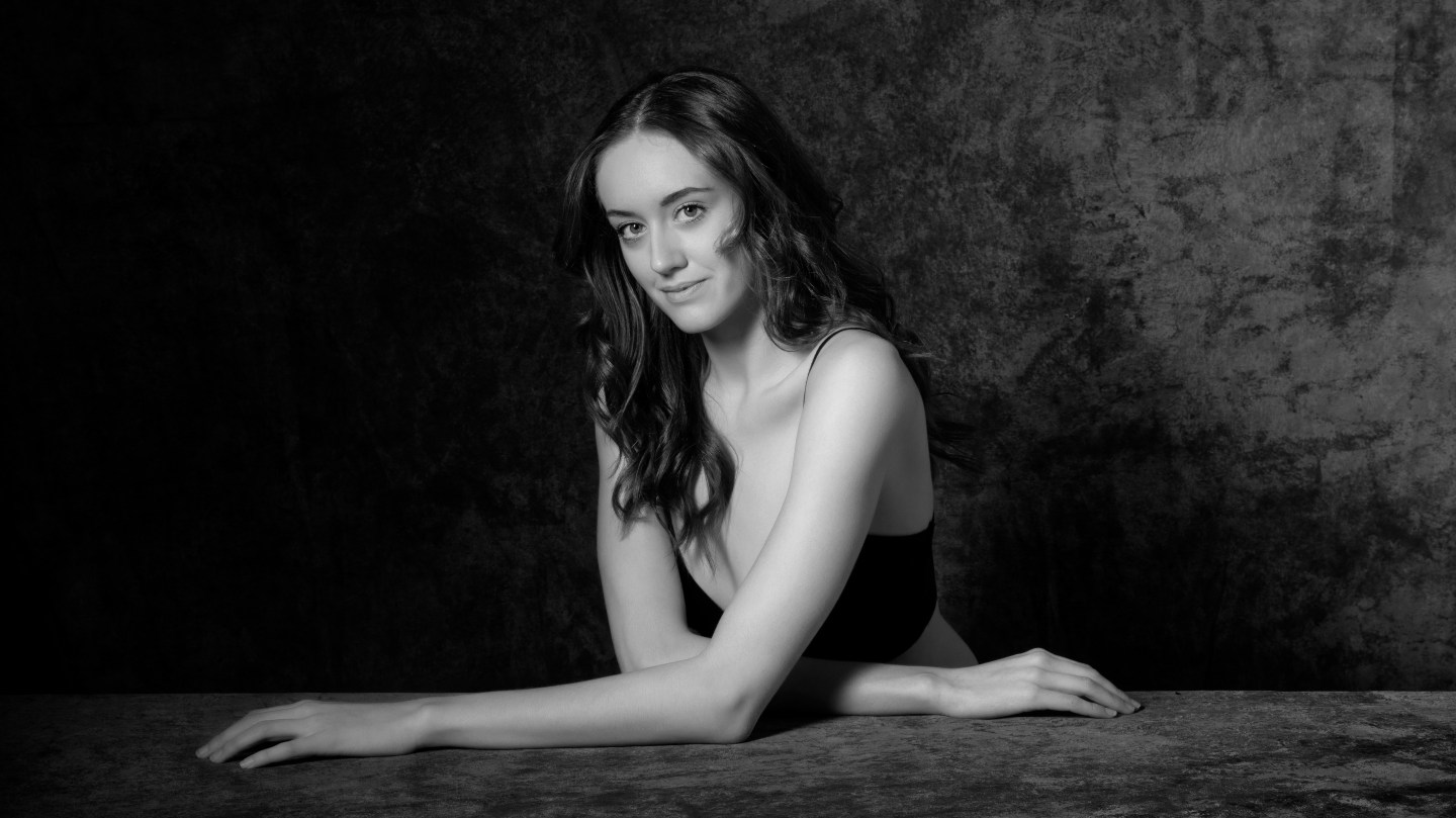 LINES Ballet company artist Tatum Quiñónez’s headshot (in black and white)