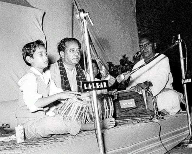 Young Zakir Hussain performing with his father, Ustad Alla Rakha