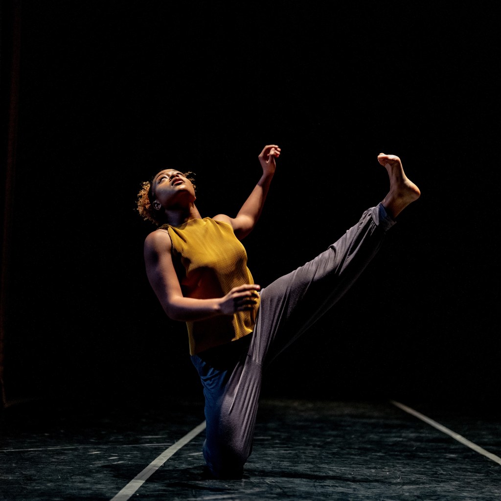 Former BFA at Dominican student performing during dress rehearsal for the annual Fall Showcase of the Alonzo King LINES Ballet BFA in Dance Program at Dominican University of California at Angelico Hall on the college campus in 2018